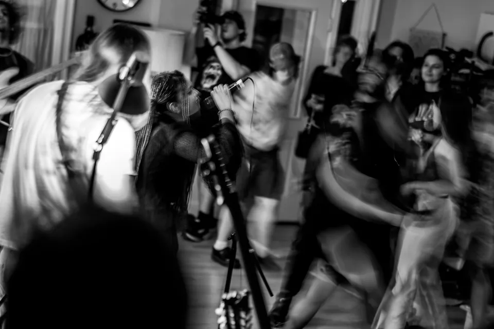 Crowd dancing in a blur of motion