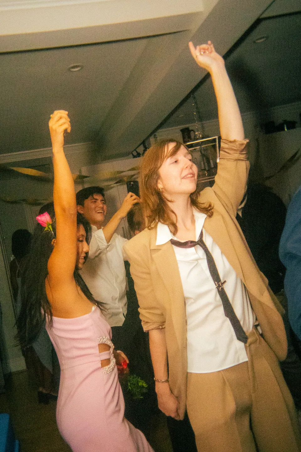 Dancers with arms in the air