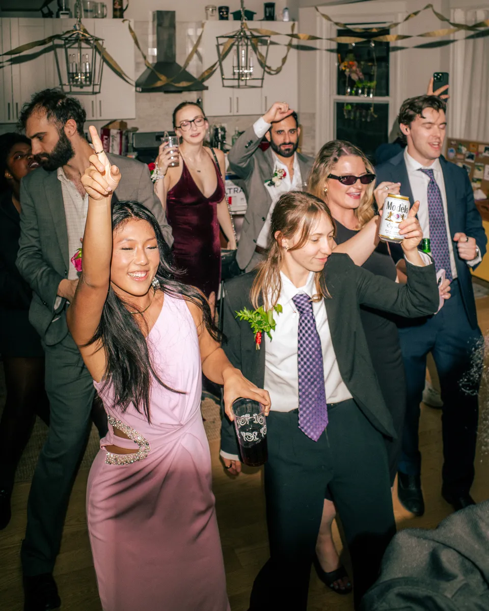 A crowded dance floor of prom-goers
